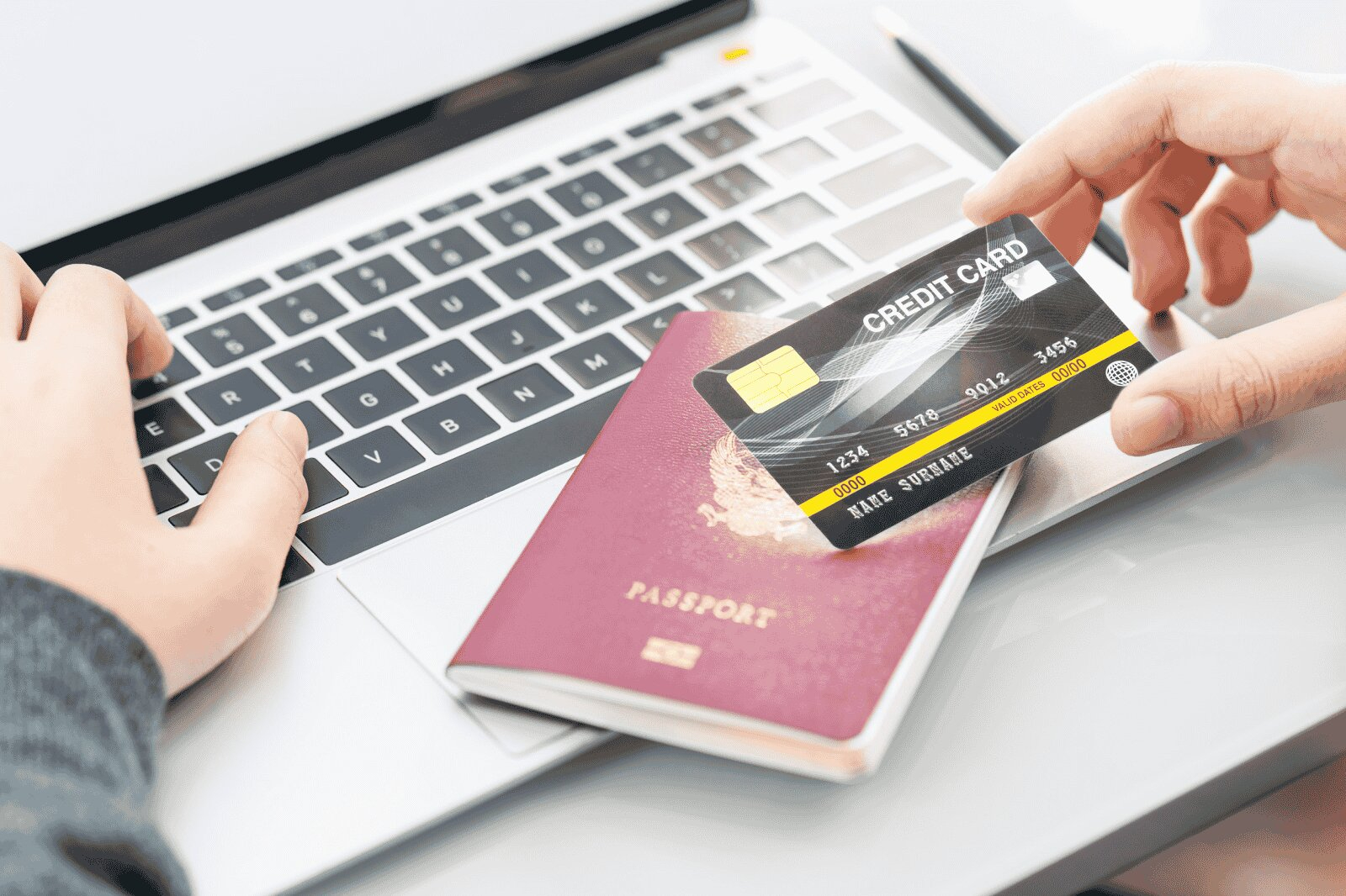 A Person Using A Card To Make A Payment