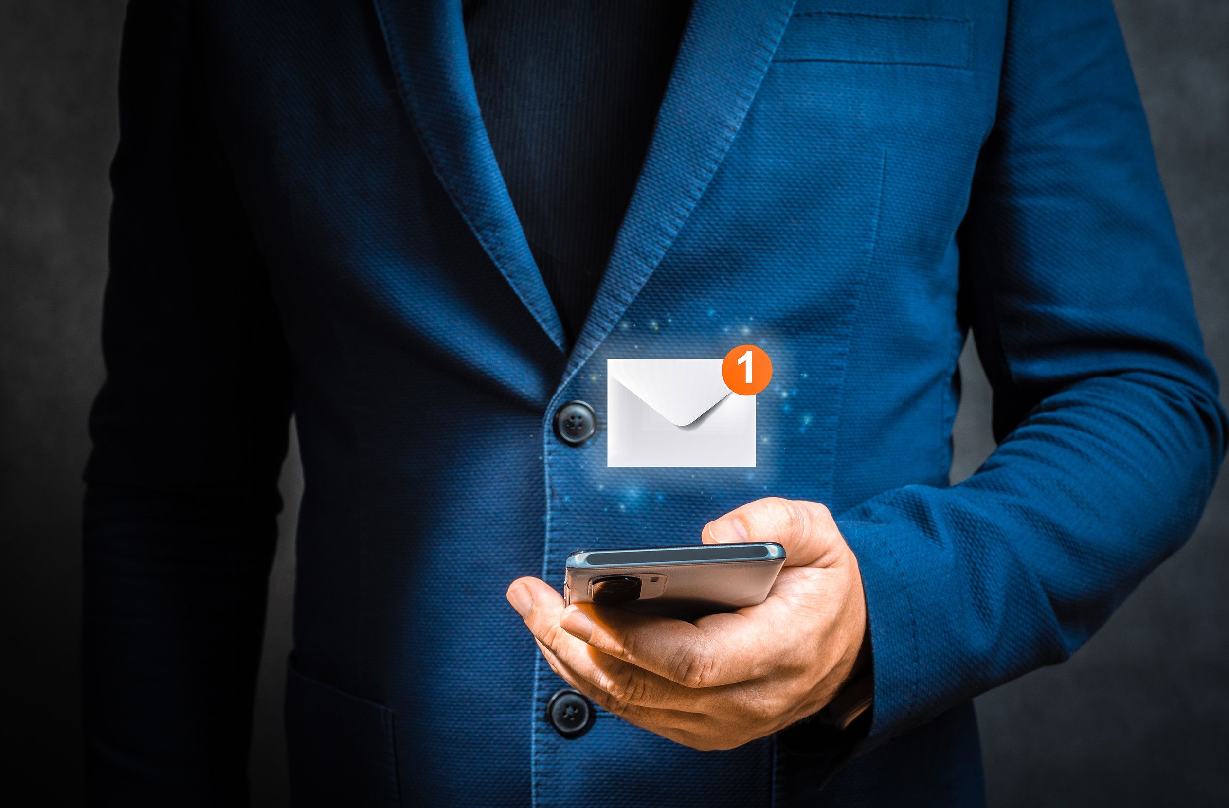 Holding cellphone with virtual letter icon for application
