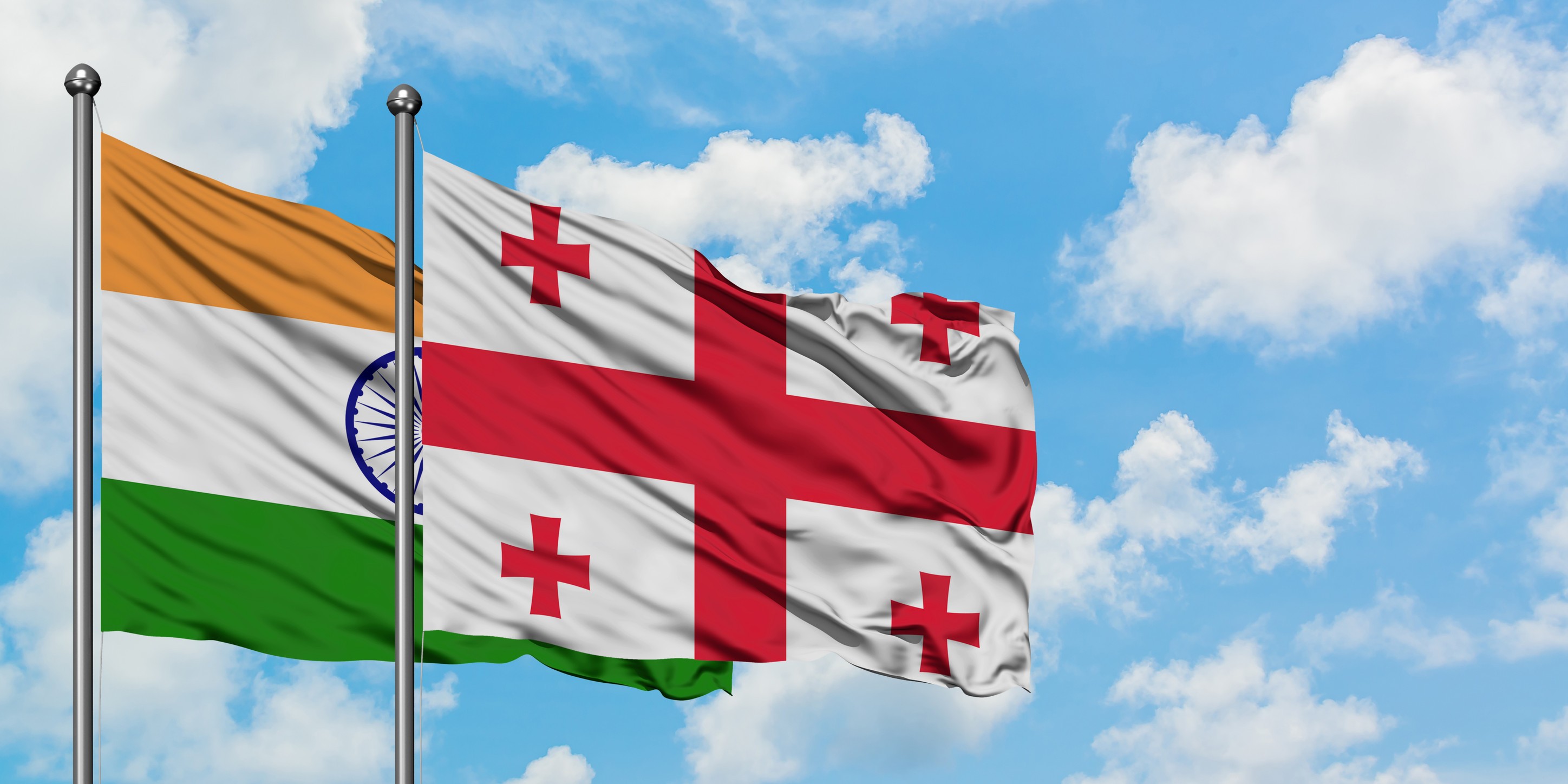 India and georgia flag waving