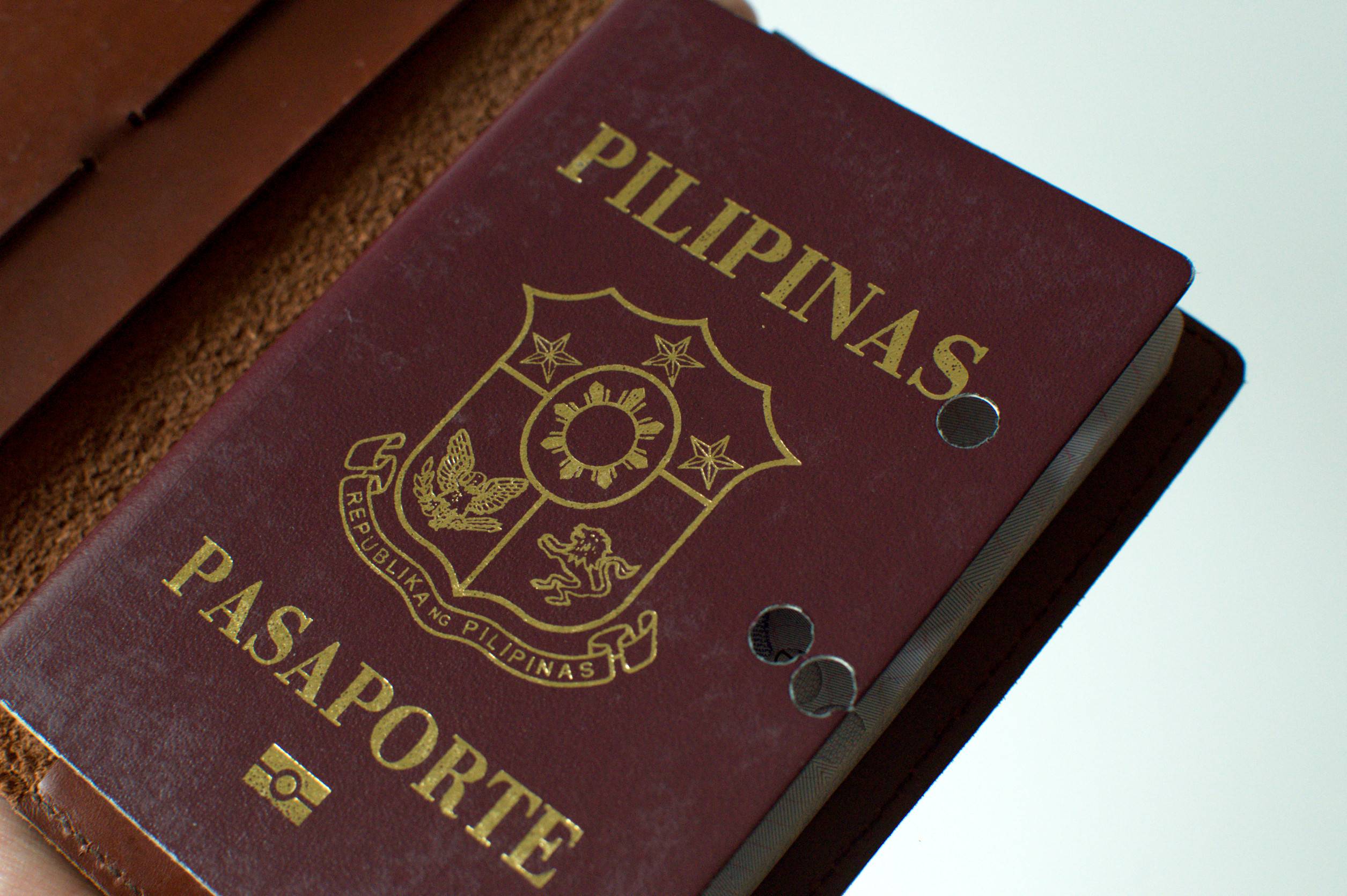 Old hole-ridden Philippine passport
