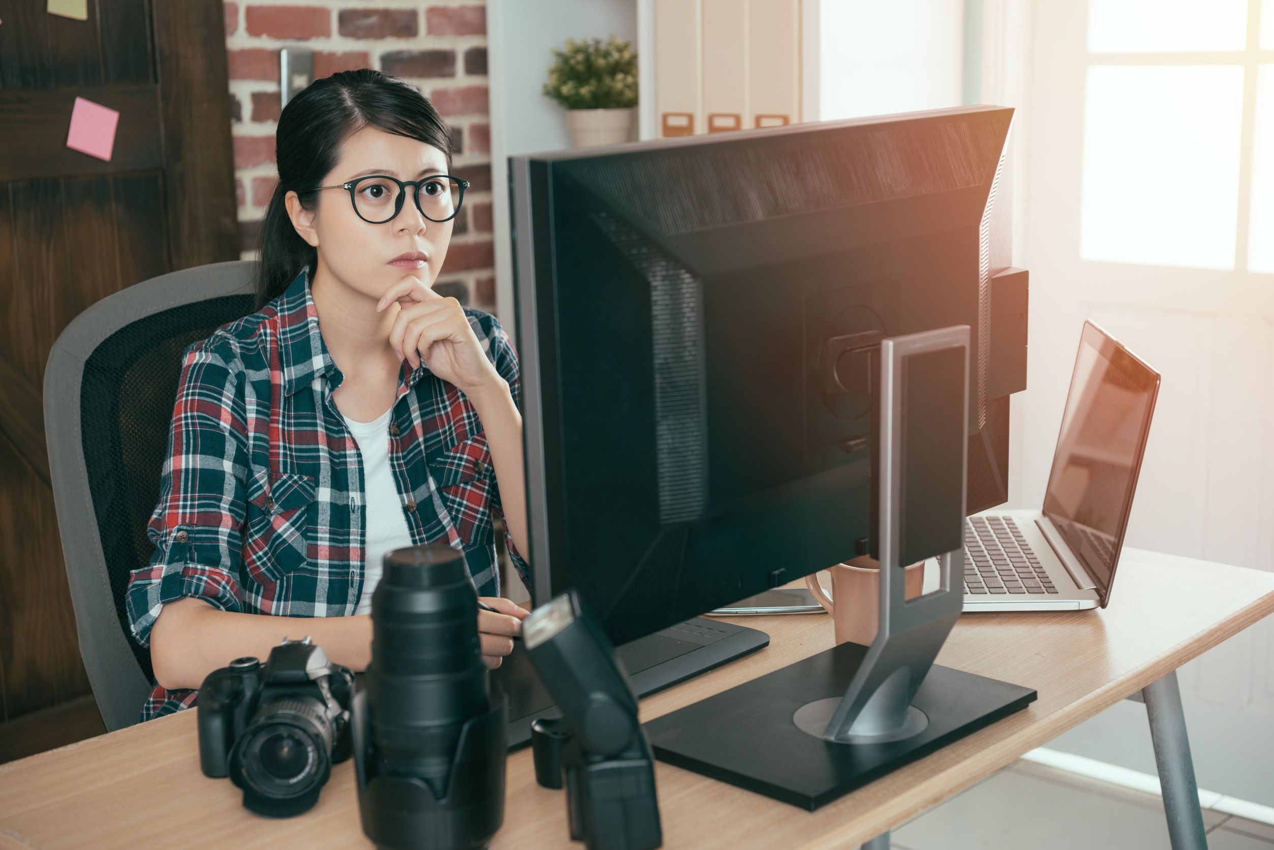 Woman holding best discount card, focus on bank and card